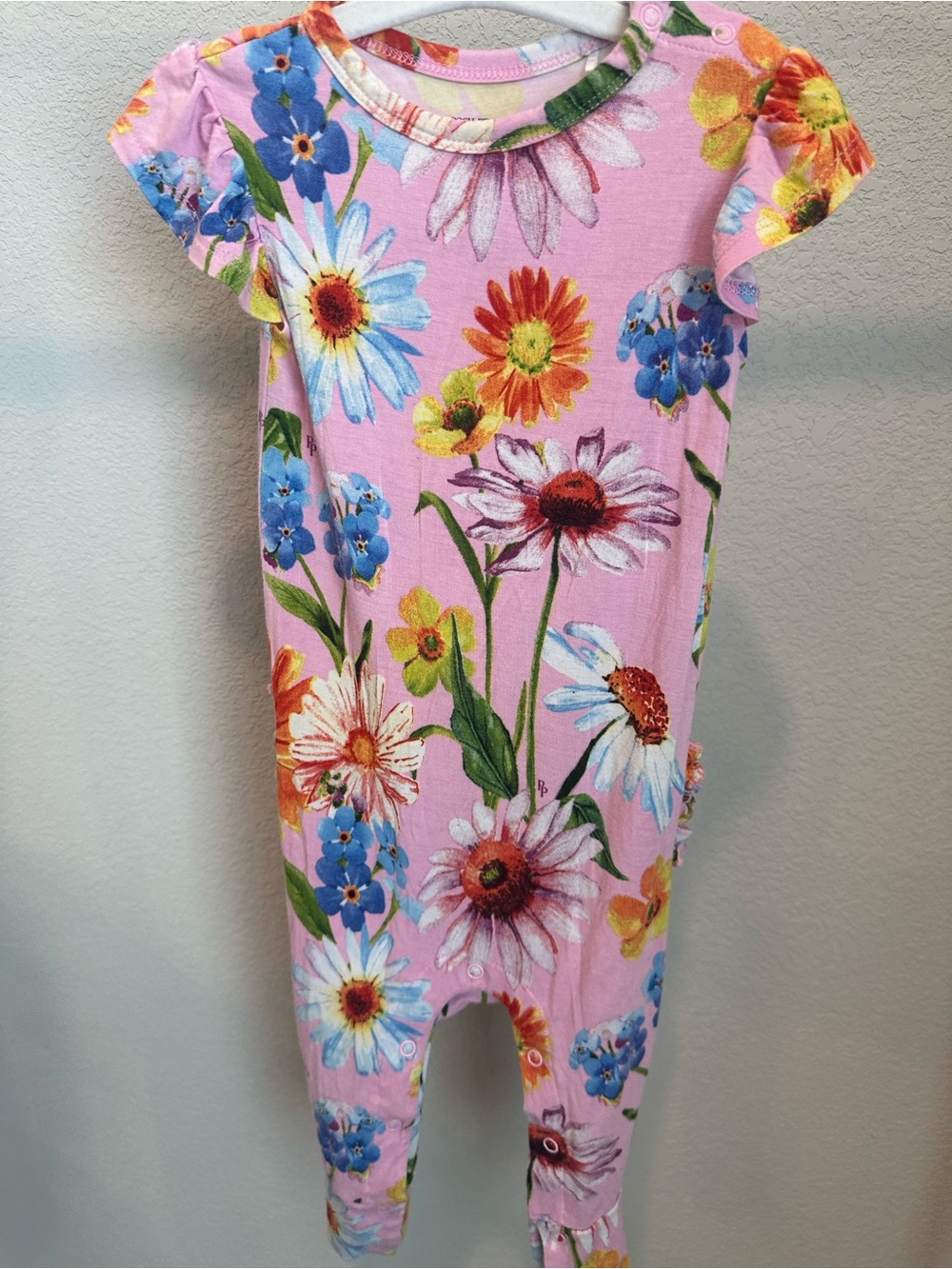 Limited edition Posh Peanut Pink Floral Footie Romper with Multicolor Flowers